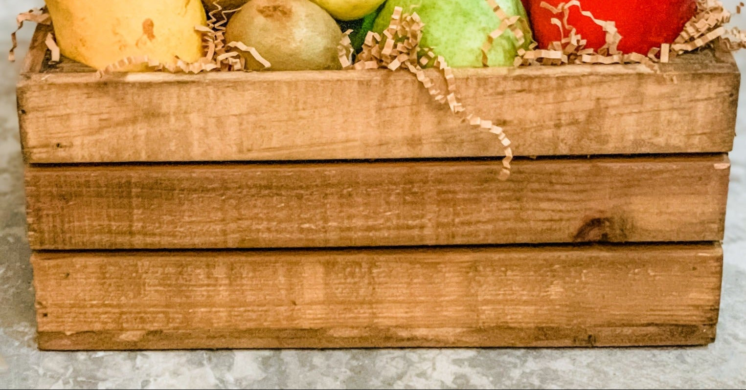 Huacal de madera con fruta